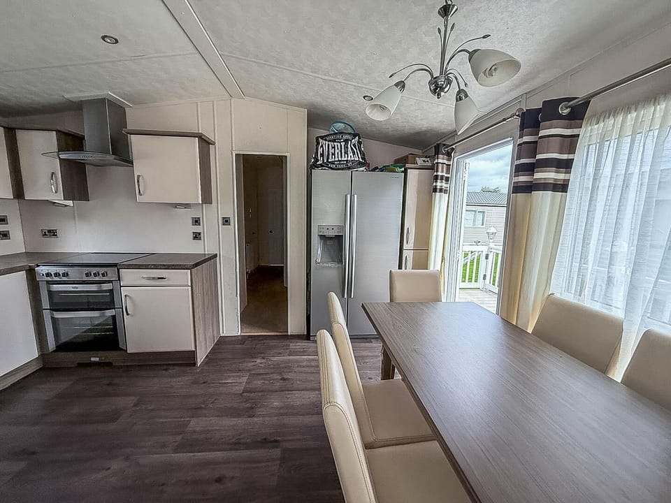 Whether you're planning last minute breaks or a longer staycation, the kitchen area in a caravan at Broadlands Sands Holiday Park ensures you can prepare meals with ease after visiting Pleasurewood Hills Lowestoft.