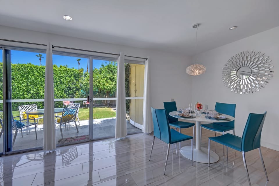 Light & bright with oversized sliding glass doors.