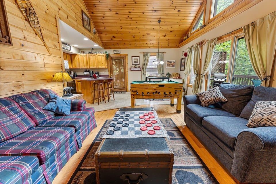 Engage in a game of checkers or good conversation in this cozy yet spacious living room.