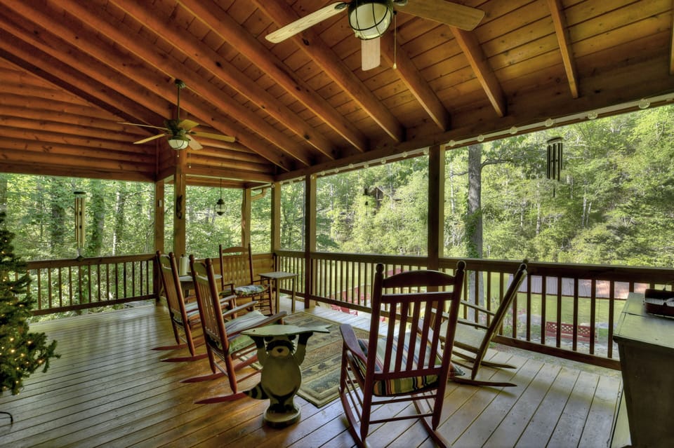 Covered front porch overlooking the river