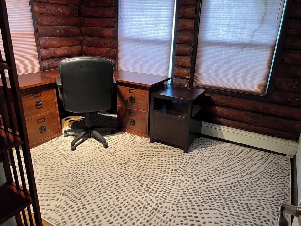 Office with sweeping views of the lawn (shades closed for picture)