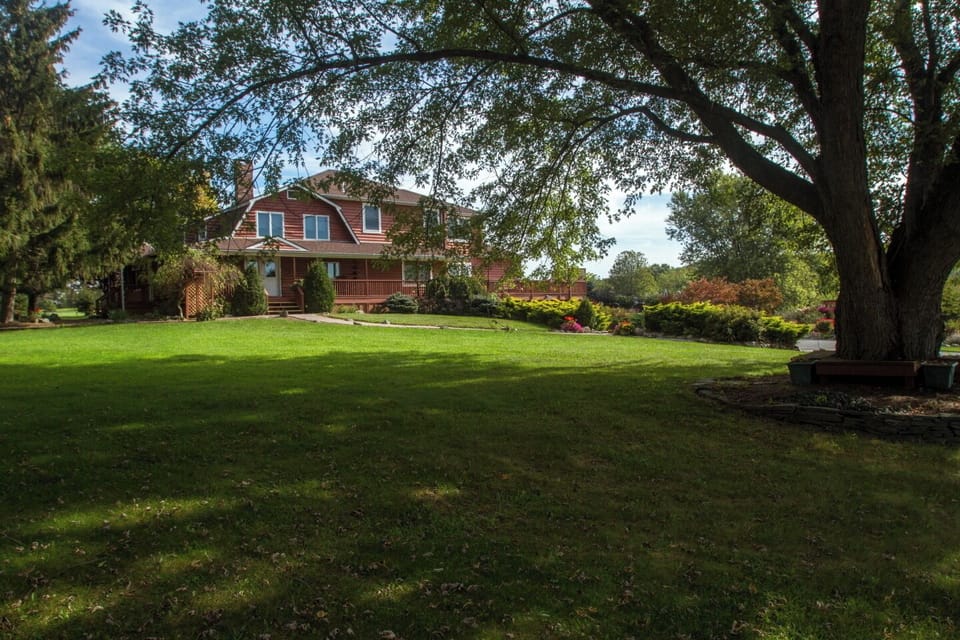 Longer view of the large front lawn