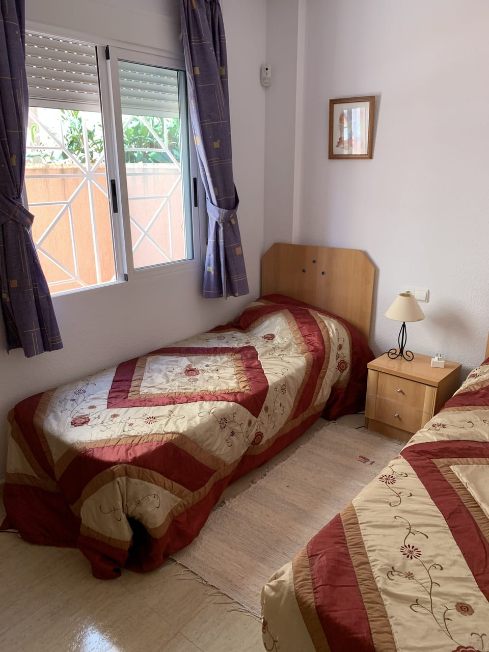 Upstairs bedroom with two beds