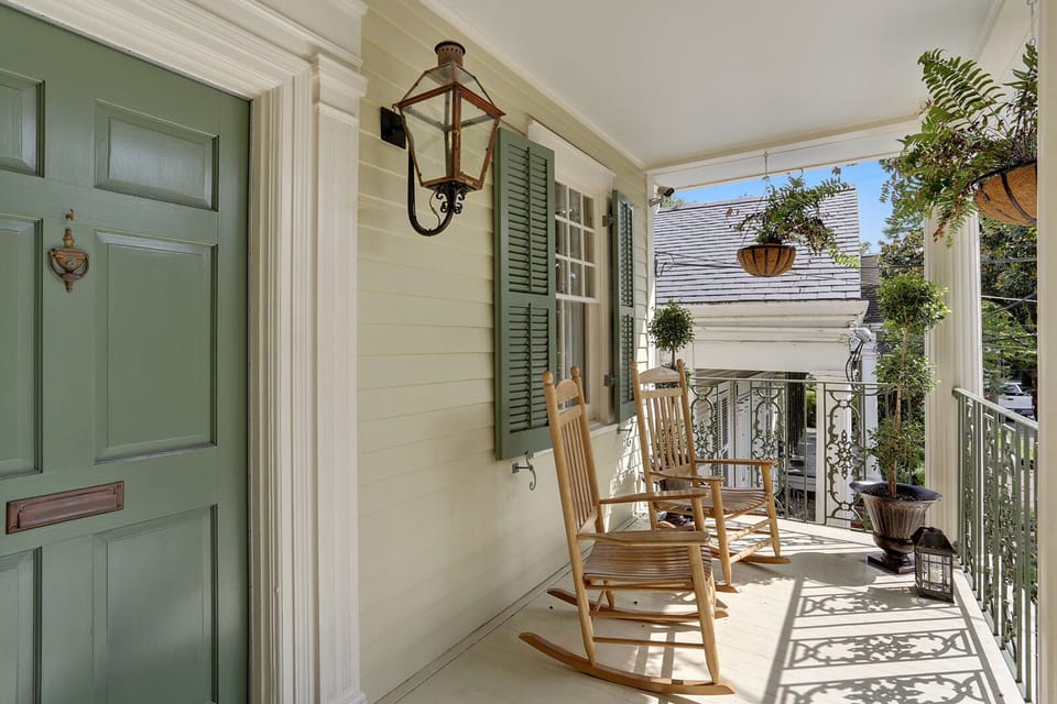 spacious porch with gas lamp lighting