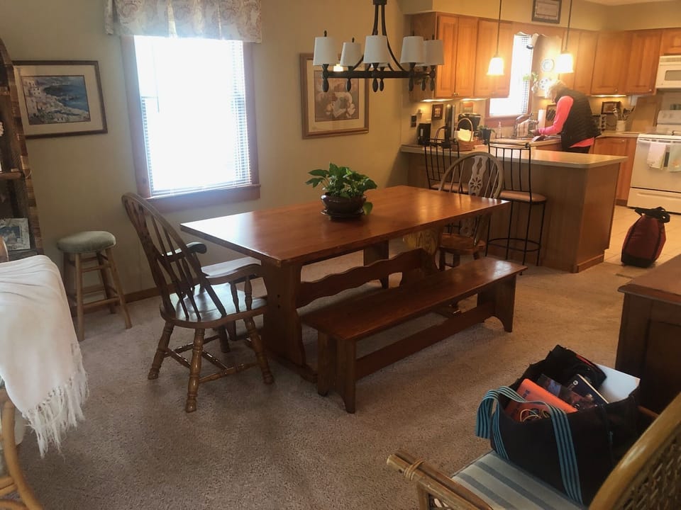 Dining room table - seats 8.  Kitchen beyond