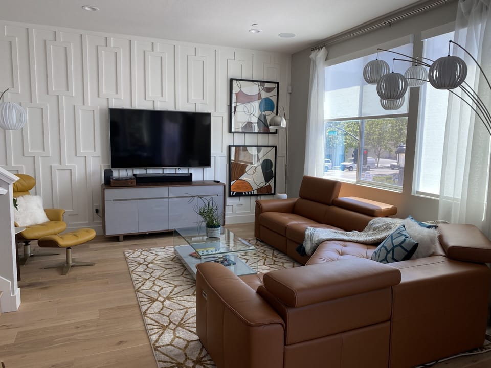 Super comfortable, double, power reclining sectional sofa & a 70” LGHD TV 