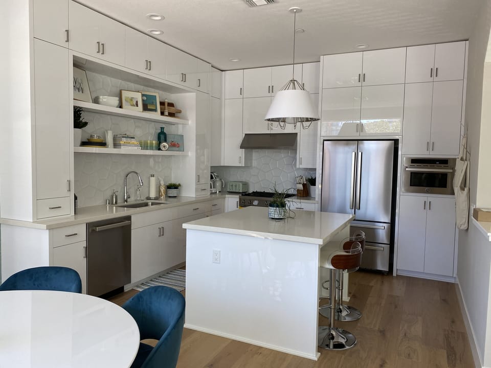Modern retro kitchen with acrylic cabinets.