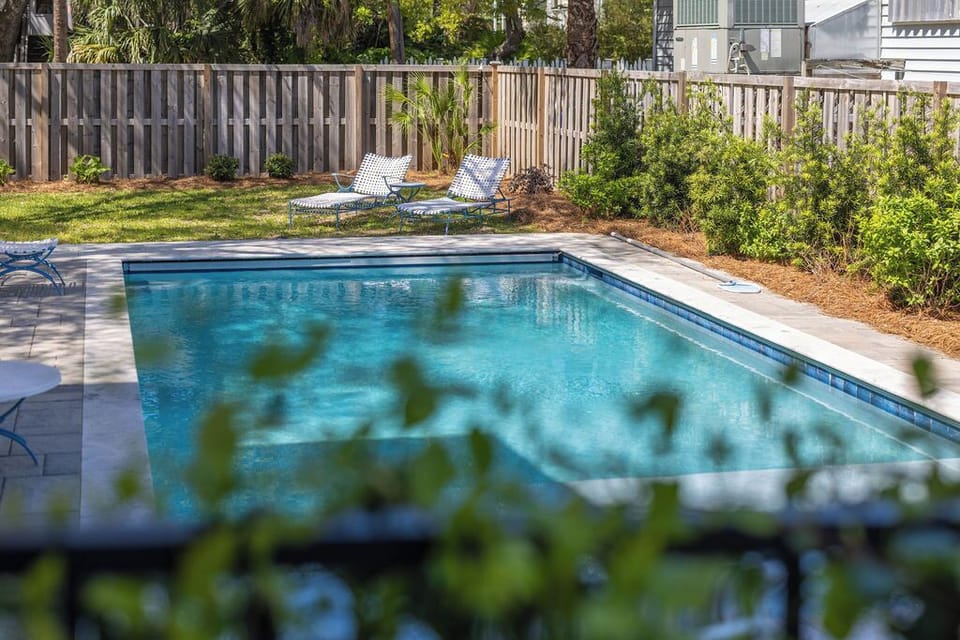 Resort-Style Pool Area – Enjoy your own private retreat in the heart of Folly Beach.