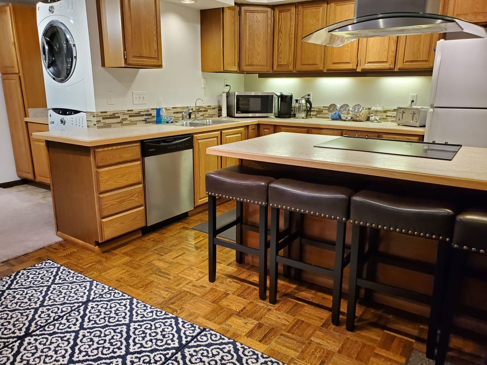 Full size washer and dryer in unit.
