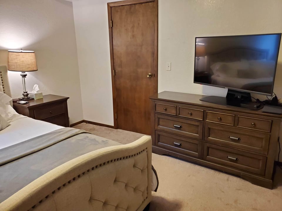 Main bedroom with queen, has FireTV and DirecTV