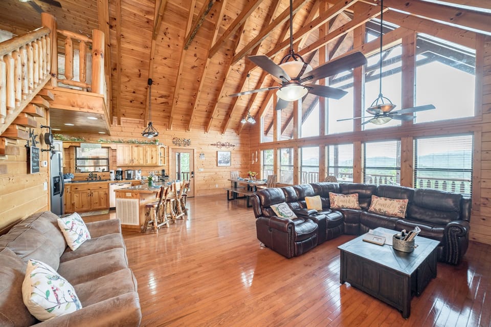 Open concept layout of the kitchen, living room, and dining room