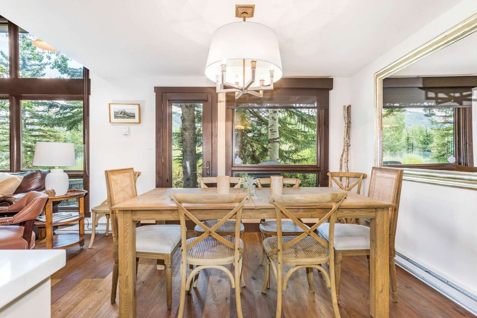 Dining Table with Seating for 6-8 and Access to the Deck.