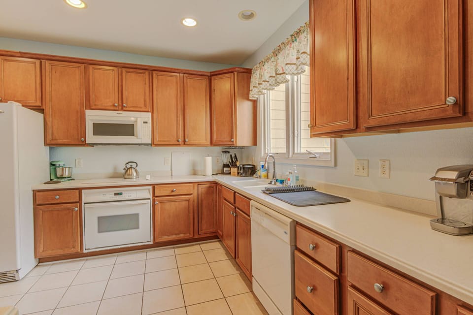 Full size appliances and ample counterspace make cooking for your group a breeze. The open layout means the chef is still part of the action.