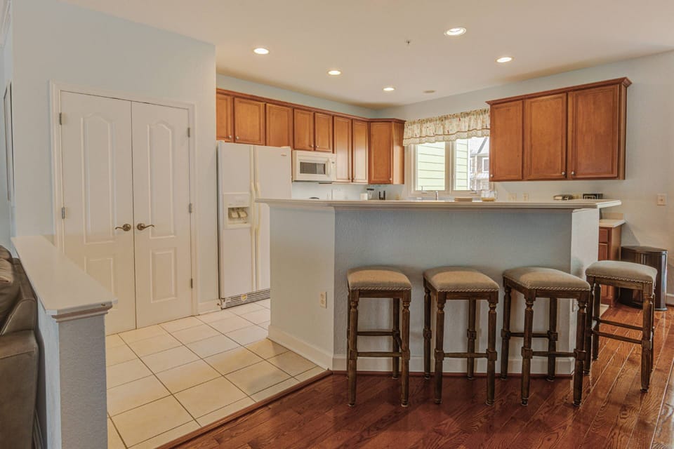 Grab a coffee and plan your day at the breakfast bar Kitchen Island & Bar Stools