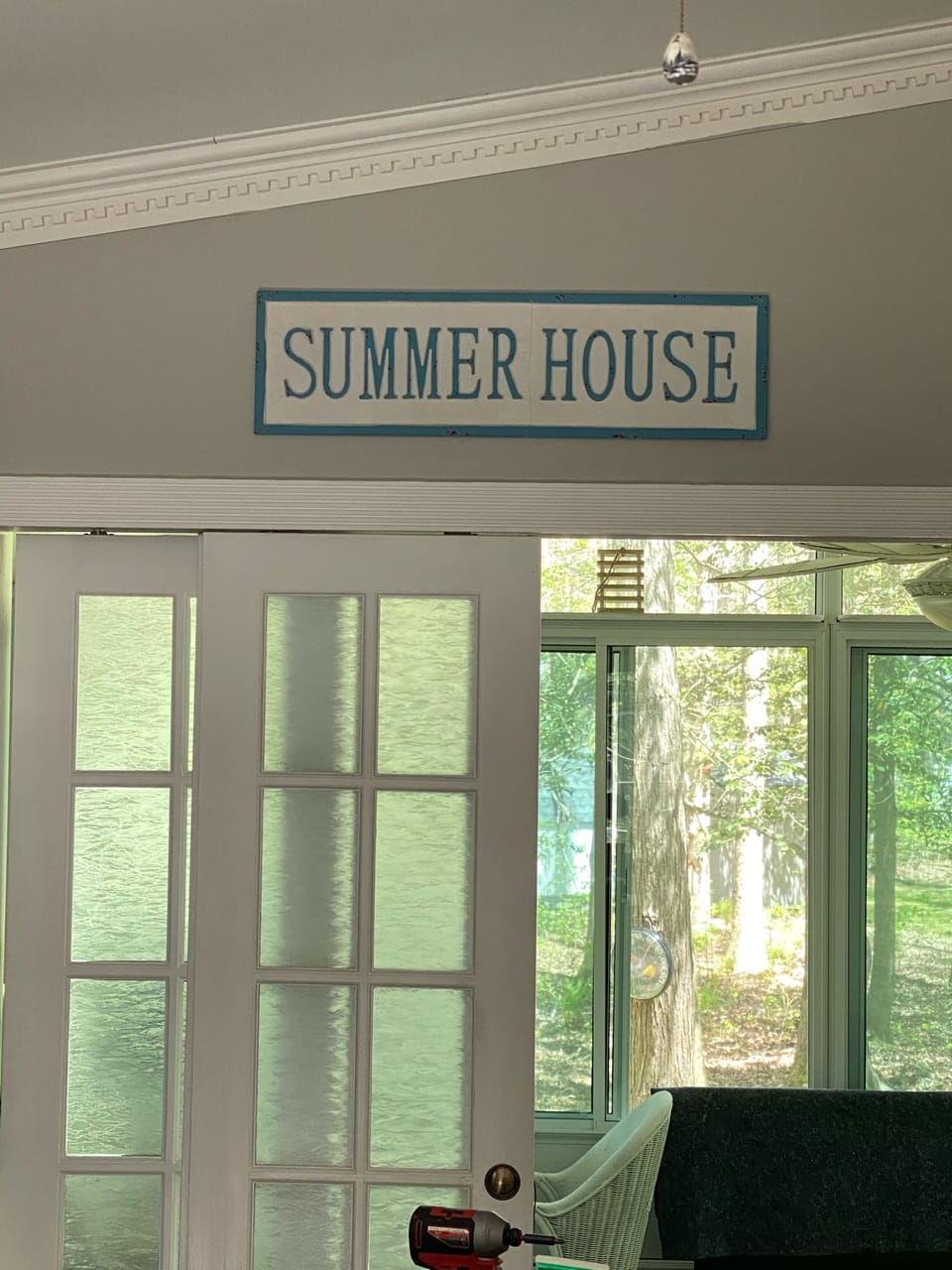 Sliding doors from kitchen to sunroom