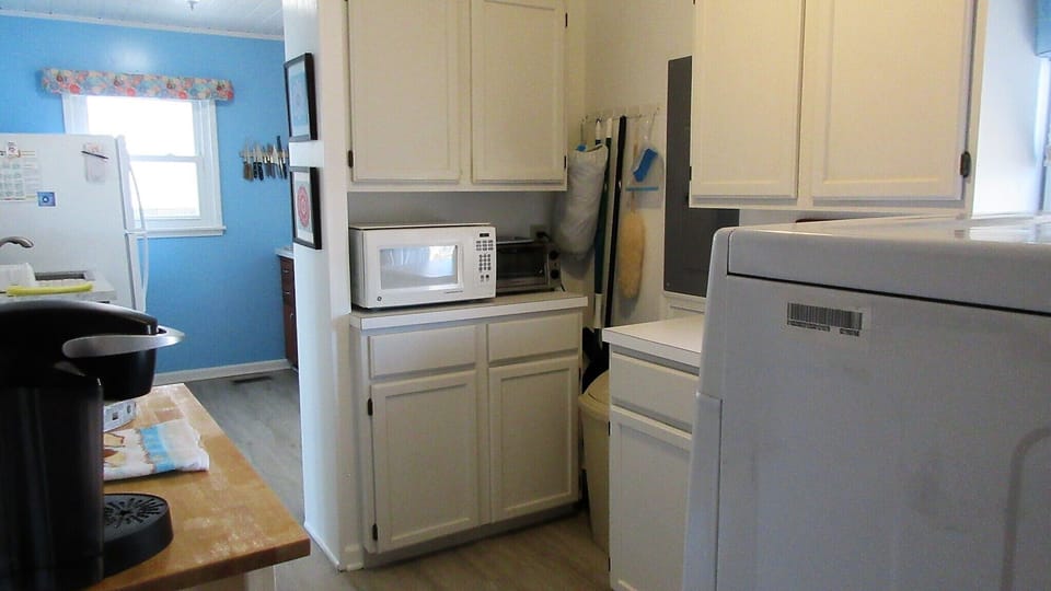 Fully stocked utility room off kitchen w/ everything you need to enjoy your stay