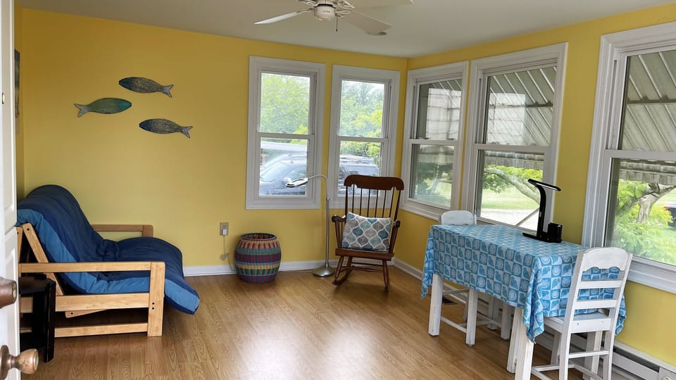 Sunroom provides perfect place for a relaxing nap or playroom for the kids!