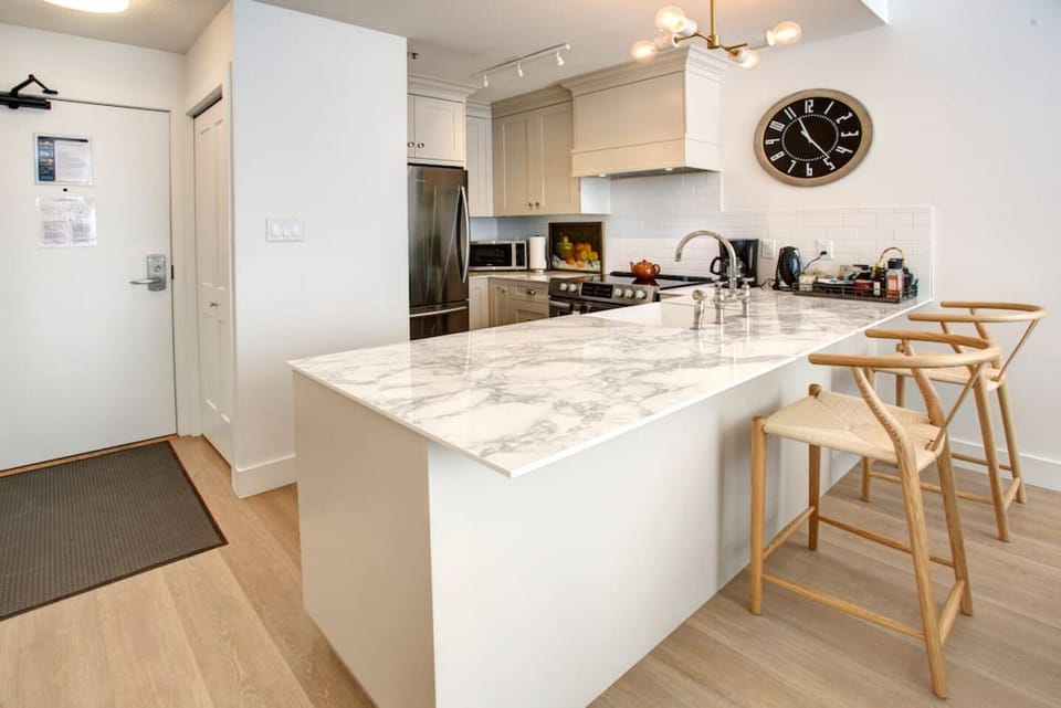 BRAND NEW RENOVATED Kitchen- NEW stainless steel appliances! `The unit was stocked with everything you needed to create a meal`-Lauren