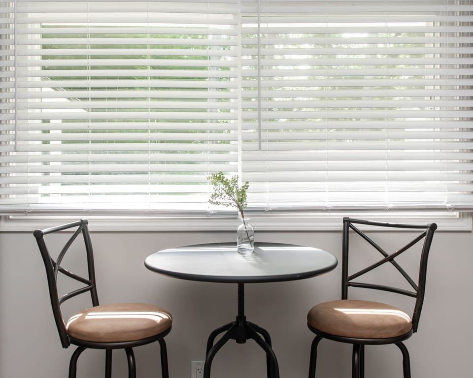 Intimate bistro table with relaxing view of our bamboo garden