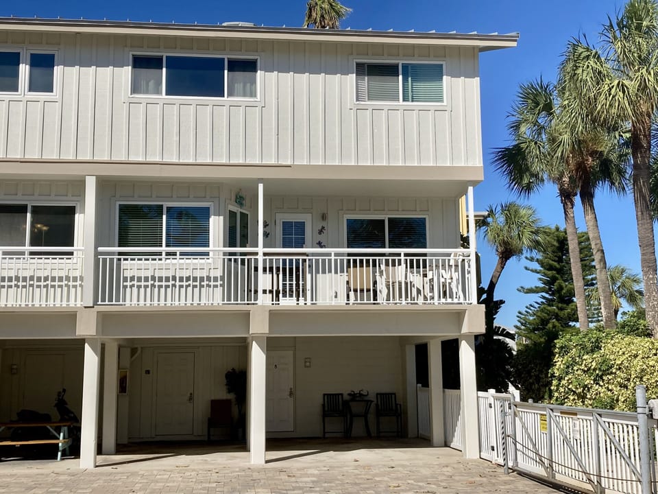 End unit in a gated community with covered parking for 2 vehicles