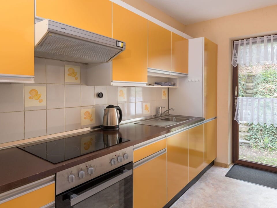Cabinetry, Countertop, Sink, Kitchen Sink, Tap, Kitchen Appliance, Kitchen Stove, Home Appliance, Wood, Kitchen