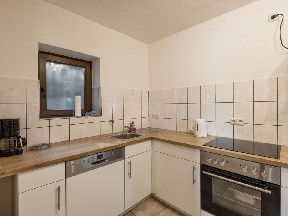 Cabinetry, Kitchen Sink, Sink, Countertop, Property, Tap, Building, Wood, Plumbing Fixture, Kitchen Stove