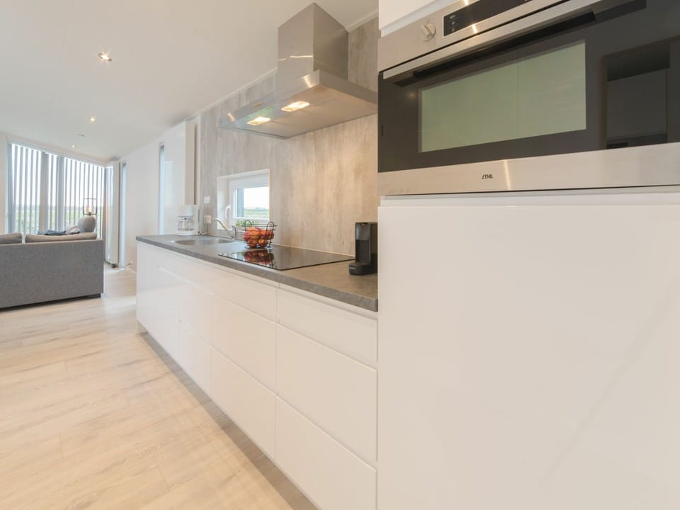 Cabinetry, Countertop, Building, Furniture, Kitchen, Wood, Tap, Kitchen Appliance, Interior Design, Kitchen Stove