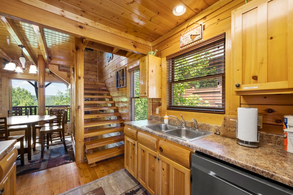 Off the kitchen is the dining area and the stairs to the 3rd level. 