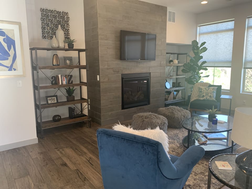 Living room with gas fireplace.