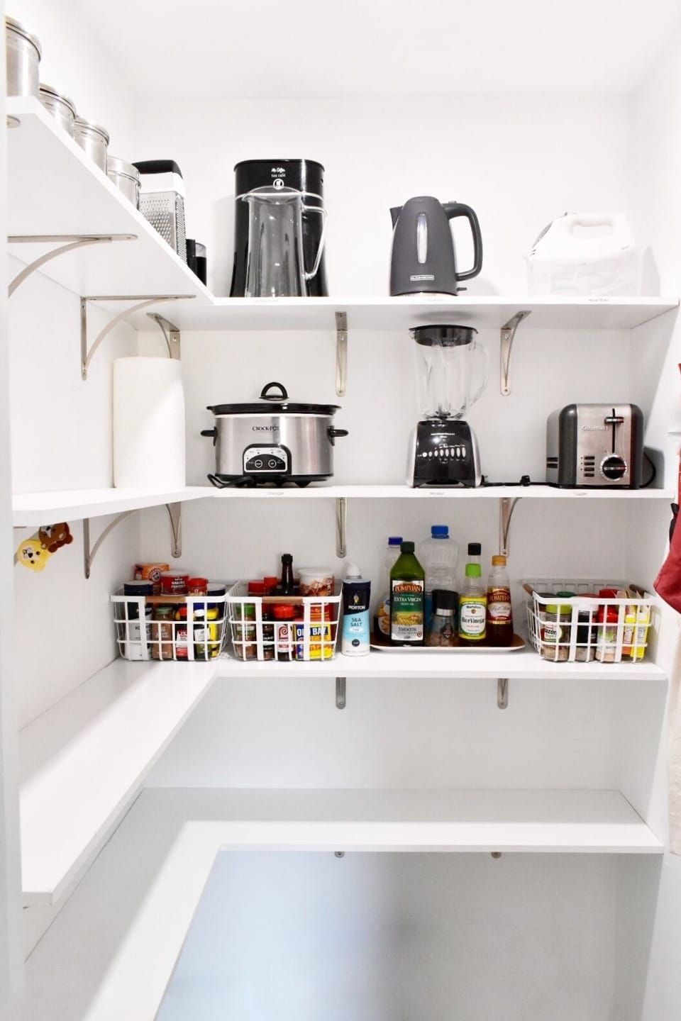 Ample pantry space, small appliances and spices to use.