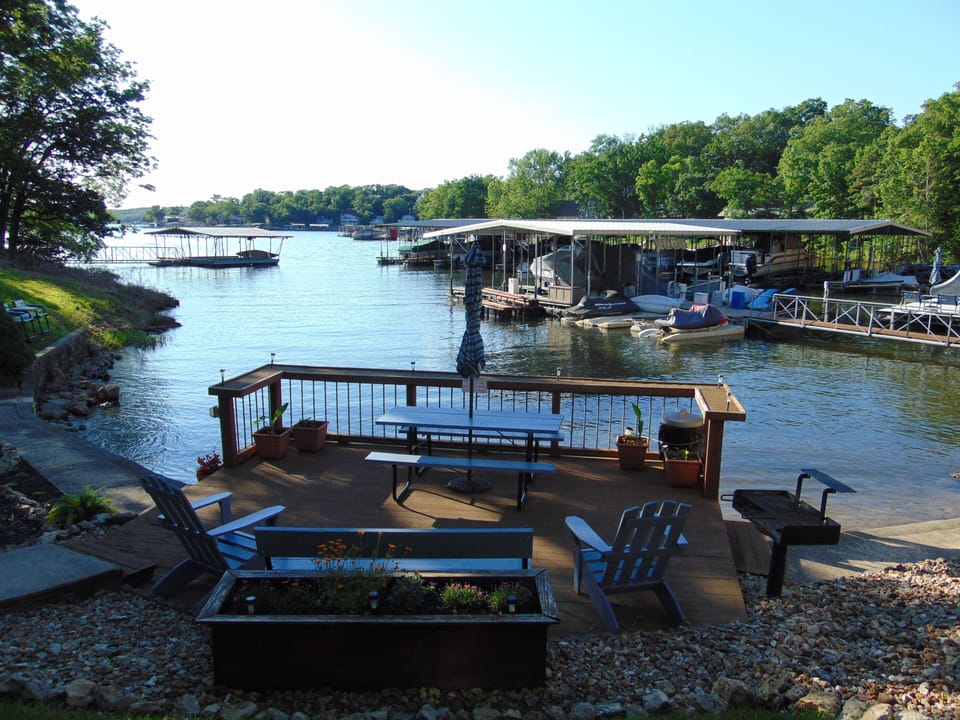 Enjoy communal hangout areas along the water. Charcoal/pellet grill available