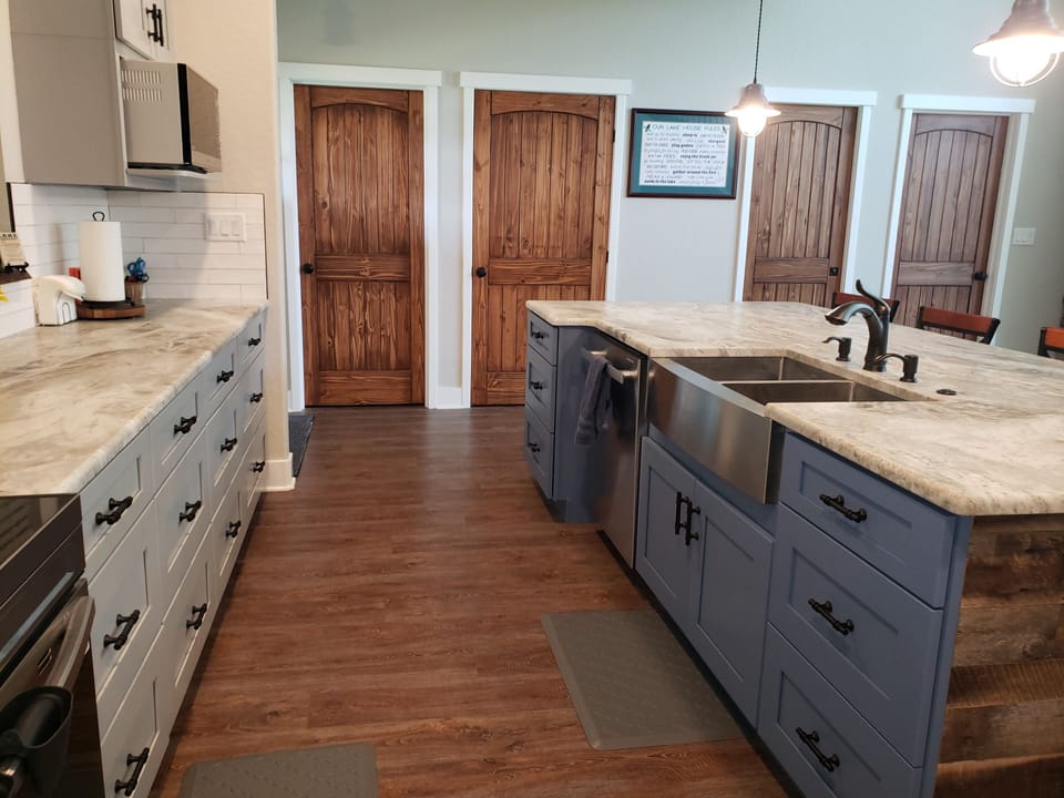 Spacious kitchen with island sink.