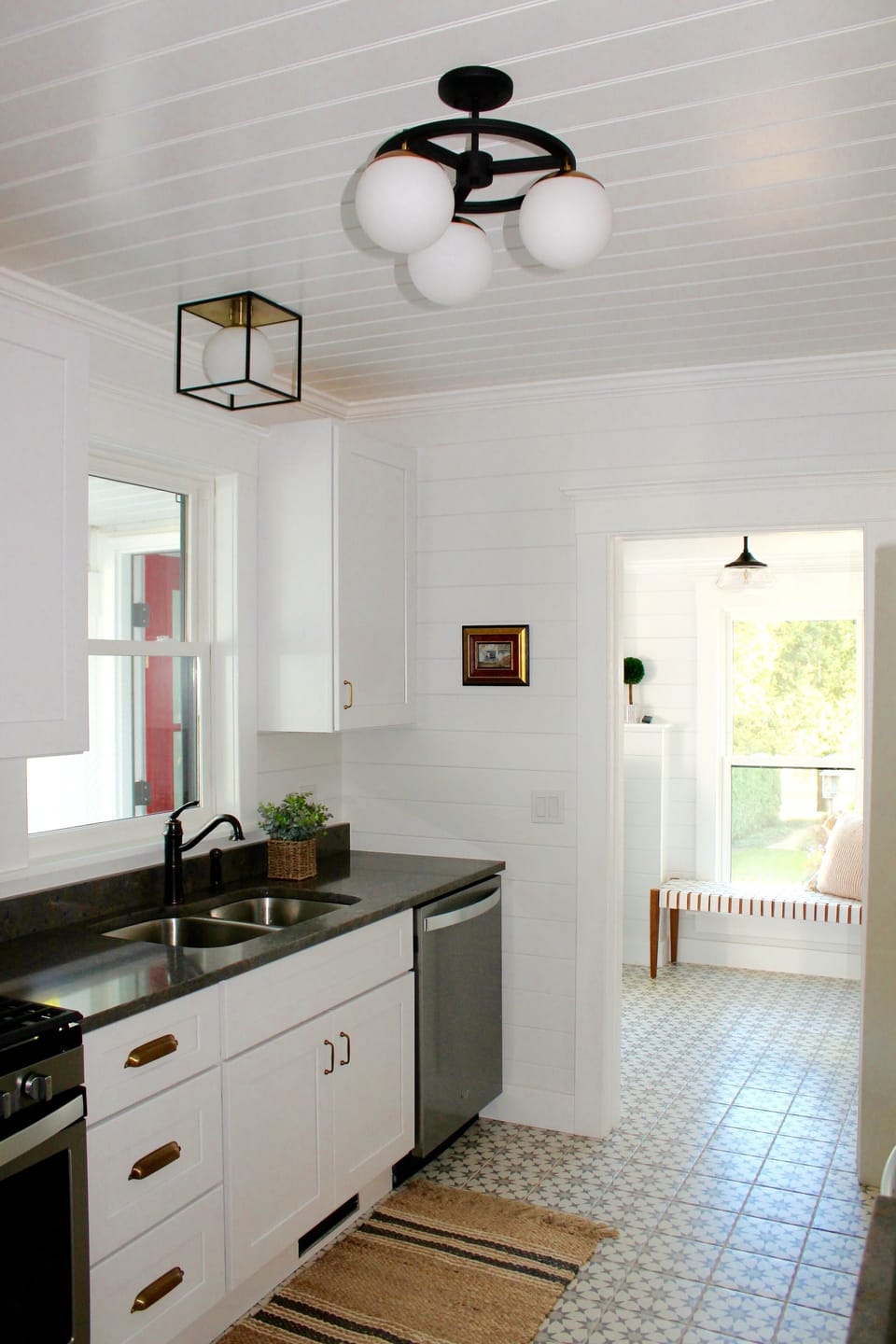 Kitchen with window right above the sink.  Modern amenities includes dishwasher.