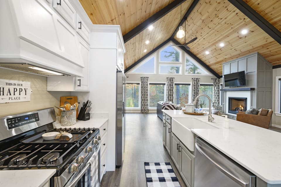 Updated appliances and airy decor welcome you into the kitchen!