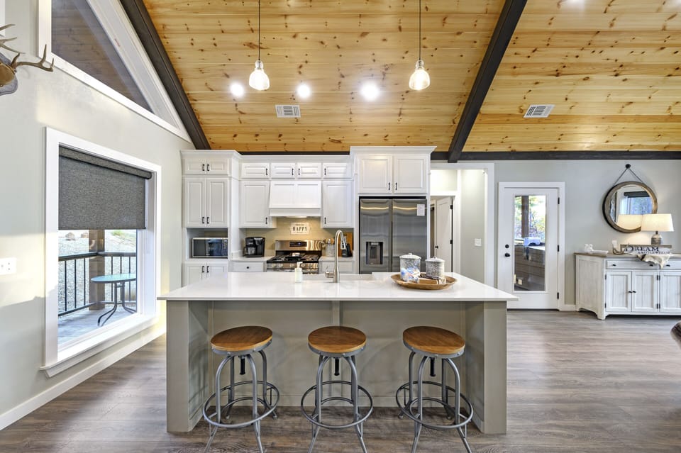 The kitchen offers additional seating at the bar top!