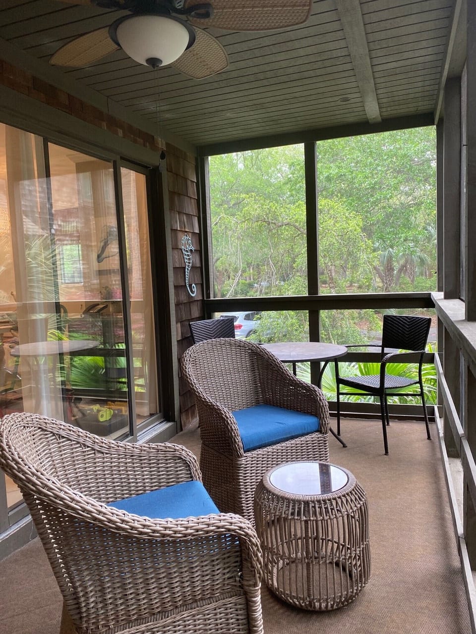 New furniture on porch.  Enjoy the screened in porch.