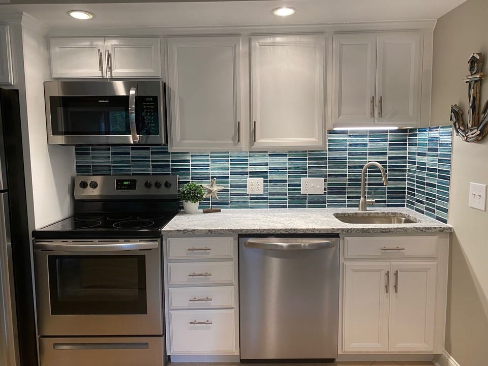 Full size dishwasher with 3 racks.