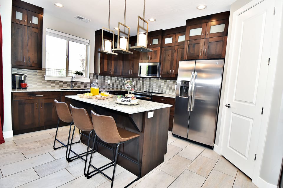 Ent 425 Pristine Clean and Fully Equipped Kitchen with an Island Top Counter