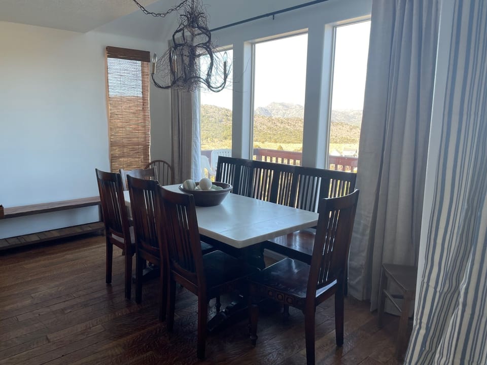 Kitchen eating area looking to back of cabin