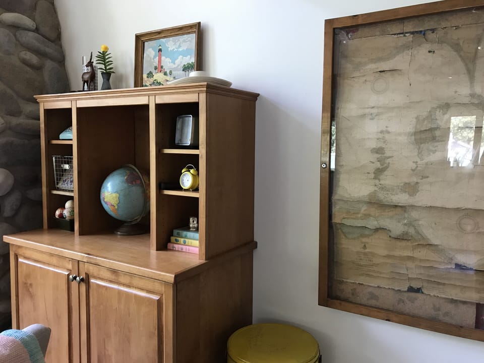 main/second floor living room, games and toys cabinet