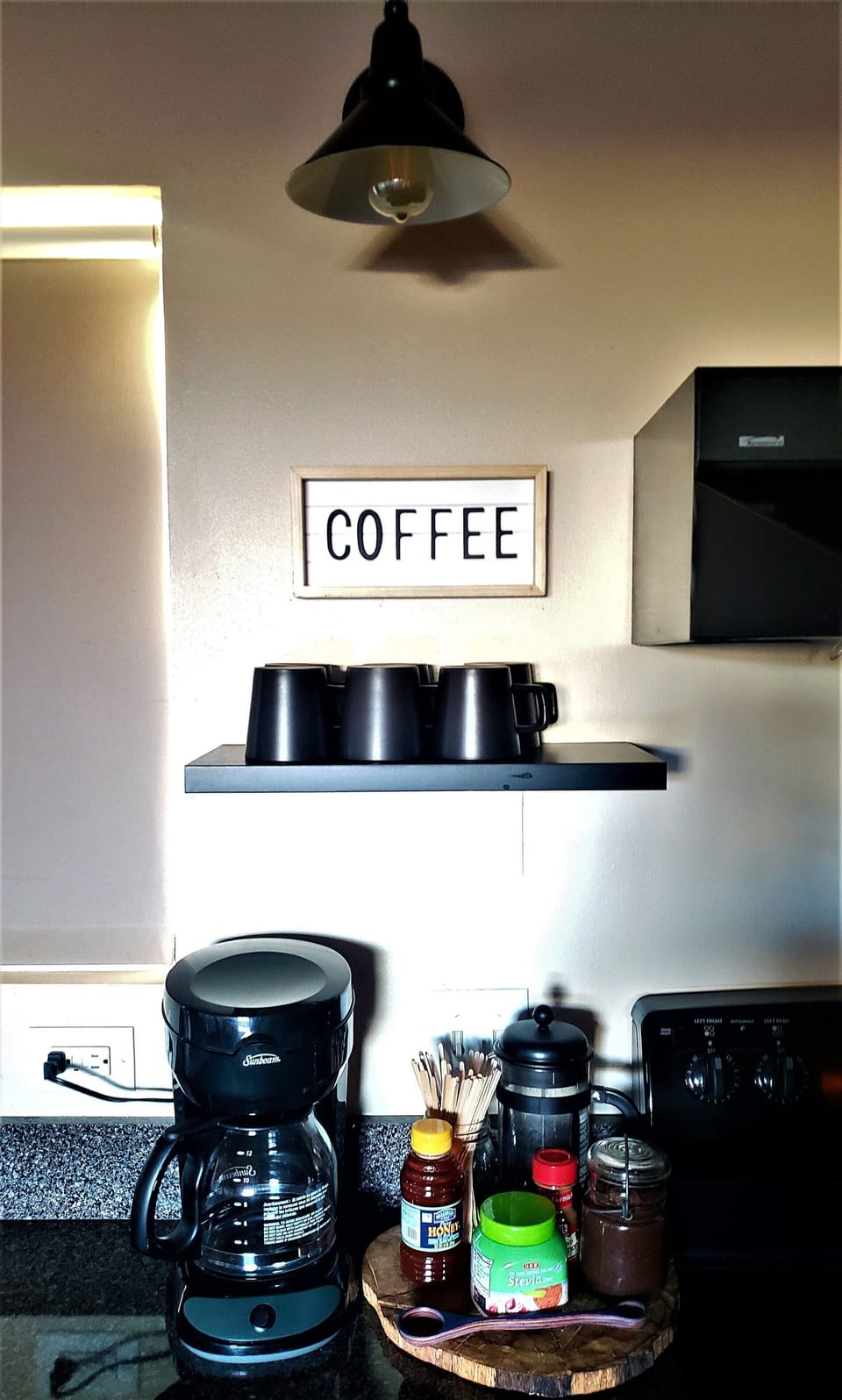 Coffee bar in kitchen - drip & French press coffee devices provided