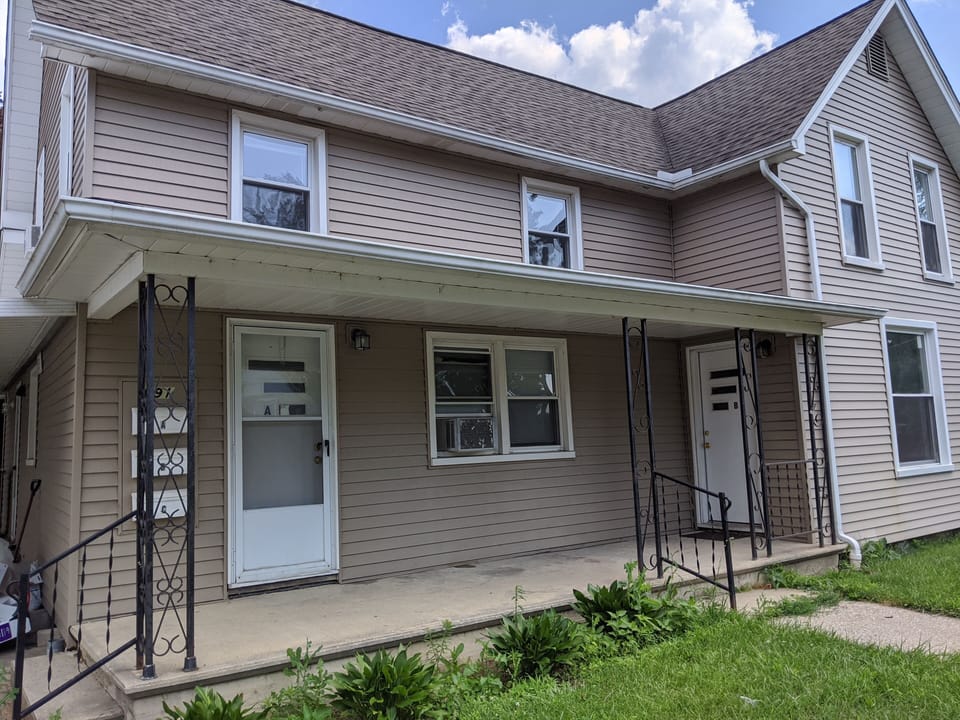 Apartment A is on the right and a side door by the patio not shown