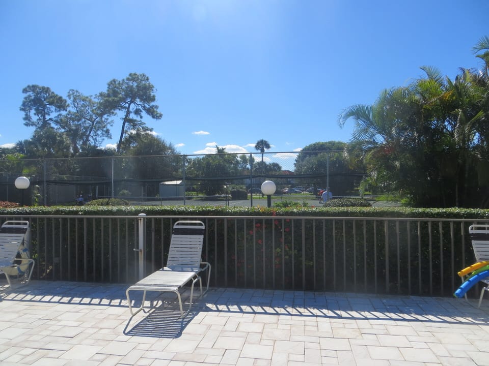 View of the tennis courts from the pool. 