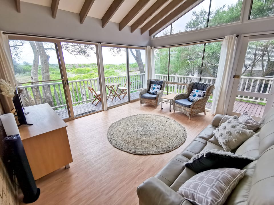 Living Area with views over the wetlands and to the beach.