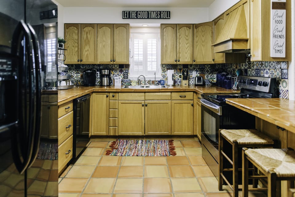 Fully equipped kitchen including blender, crockpot, coffeepot, griddle and more.