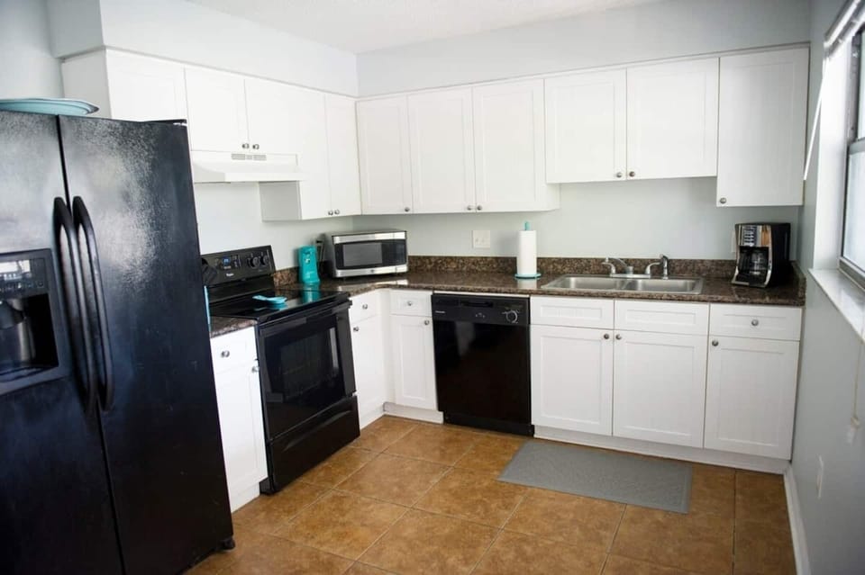 Our renovated kitchen gives you all the amenities of home, especially if you want to make your own meals (or cocktails) while enjoying your stay.  The kitchen is complete with a dishwasher, microwave, coffee maker, blender, can opener, and ice maker.
