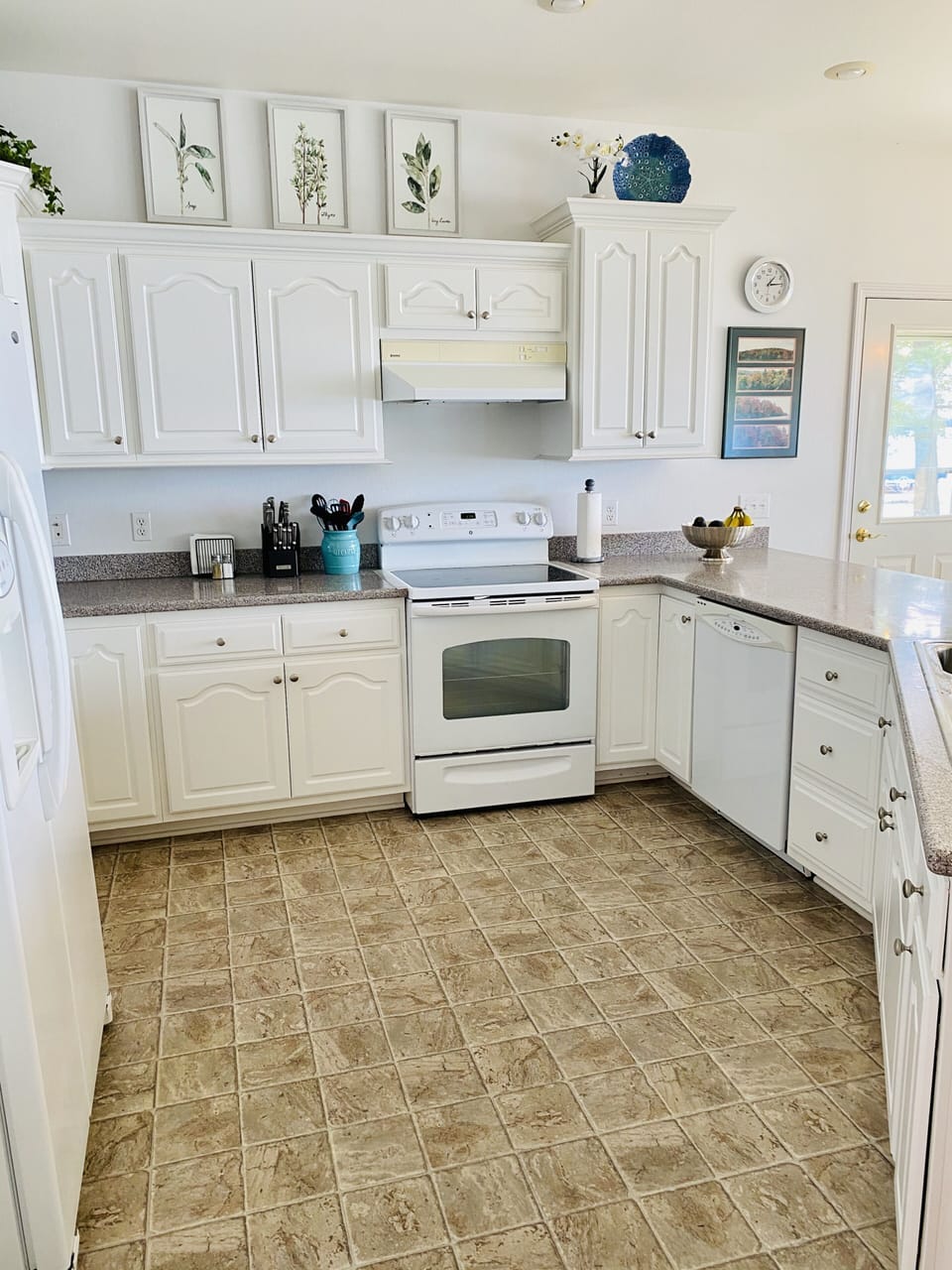Kitchen with old flooring.