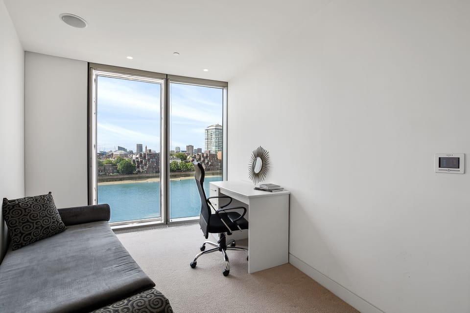 Office with single sofa bed