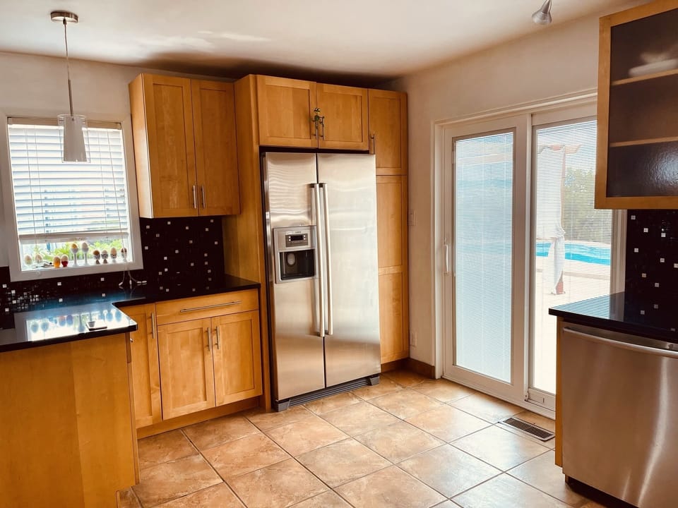 Main kitchen connected to the pool and courtyard 