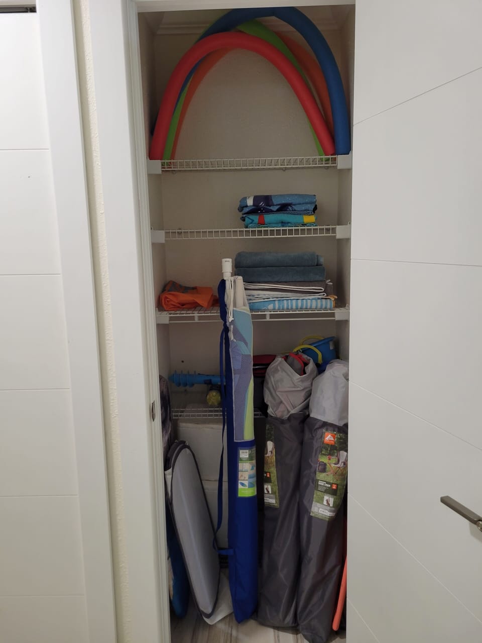 Beach chairs, umbrella, towels, cooler and few other things. 